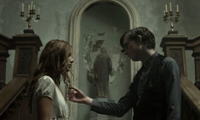 Bill Milner and Charlotte Vega in The Lodgers